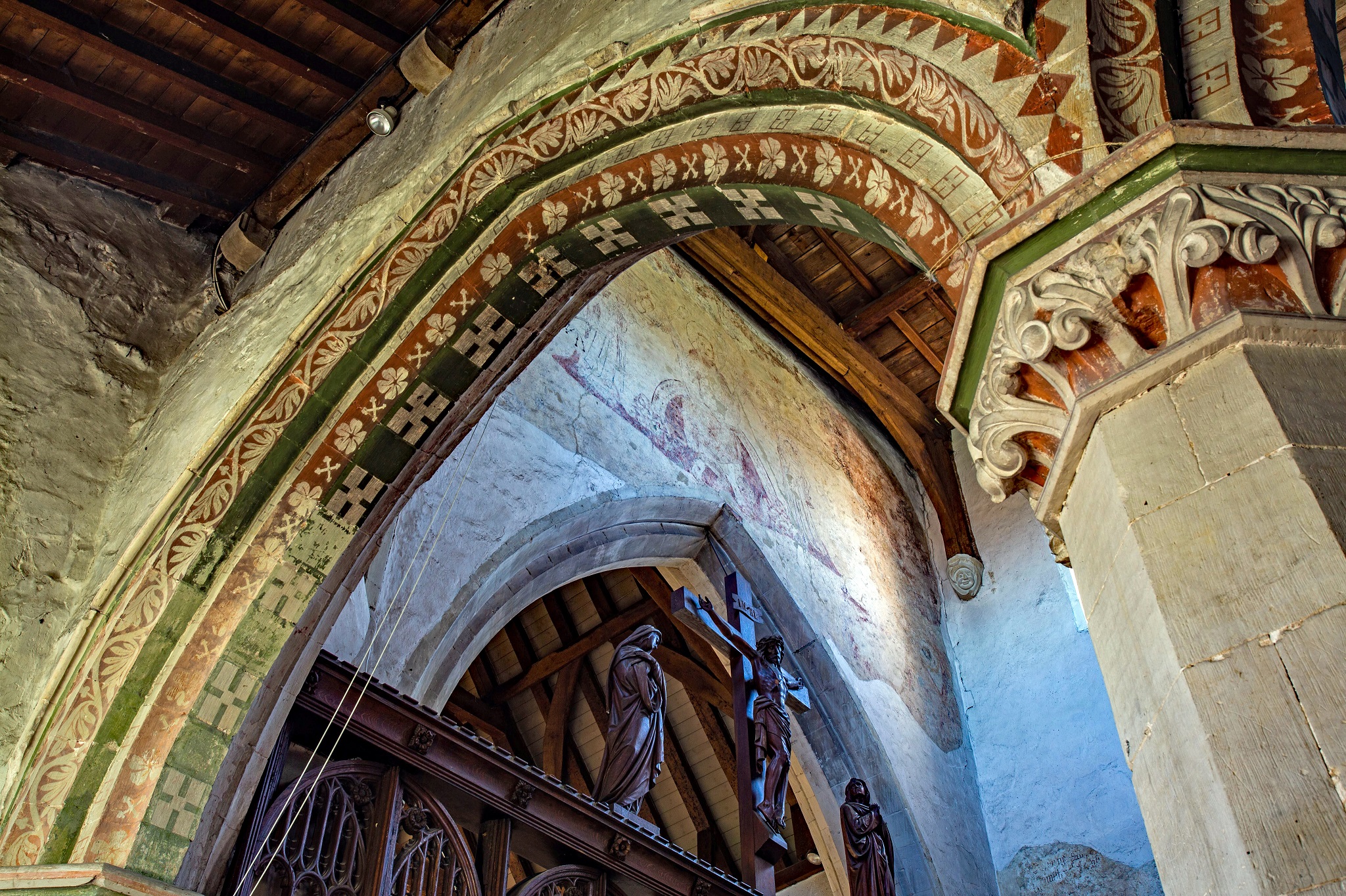 Flamstead Church painted arch, medieval wall painting and rood screen. Photo by Two Tails Creative