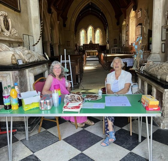 two women and a church inside